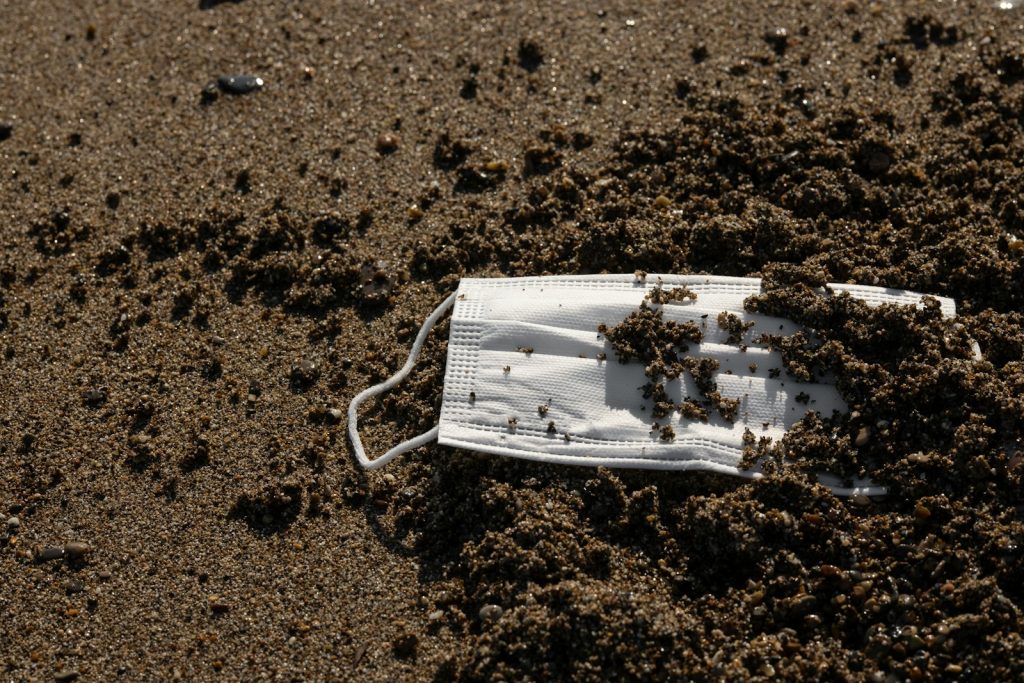 white paper on brown sand